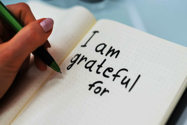 An image of someone starting to write down the things they are grateful for.